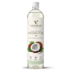 A 1000 ml clear plastic bottle of Vanorah Cold Pressed Coconut Oil, featuring a white label with green and brown coconut graphics, on a white background.